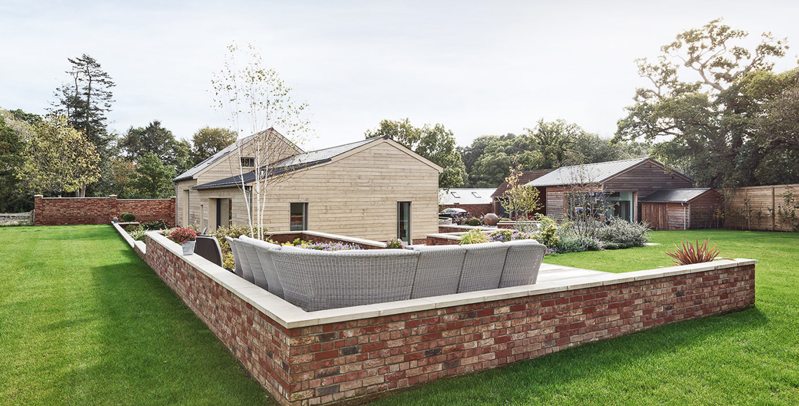 Garden outside Ellingham Barns - a three-barn conversion project in Dorset, by INKSPACE Architects and Interiors