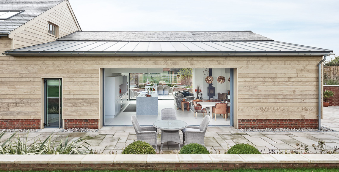 Refurbished dining area outside Ellingham Barns - a barn conversion project in Dorset, by INKSPACE Architects and Interiors