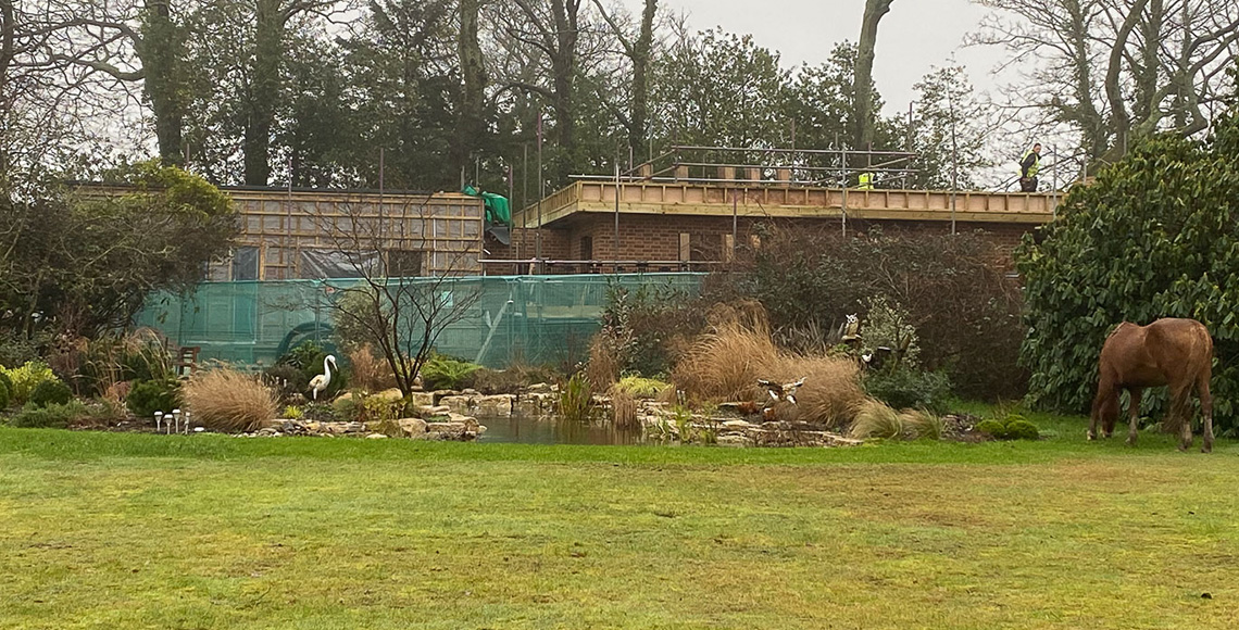 An old gym building and pool under construction in the New Forest National Park area being renovated by INKSPACE Architects and Interior Designers