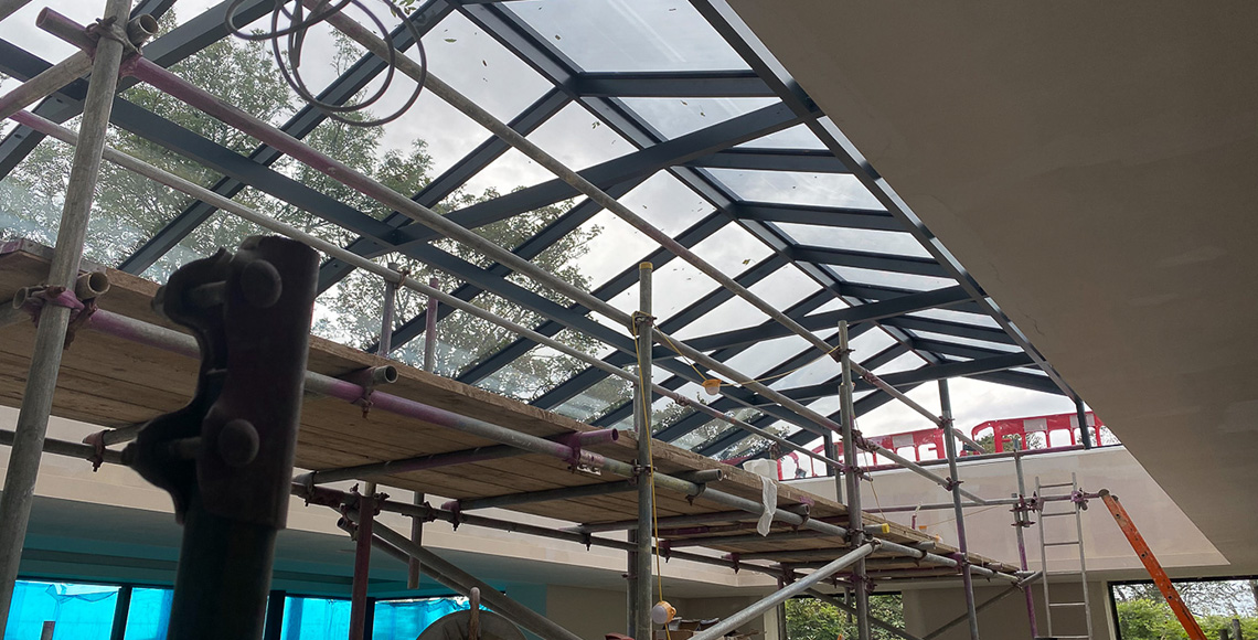 An old gym building and pool under construction in the New Forest National Park area. A renovation and reconstruction project by INKSPACE Architects and Interior Designers