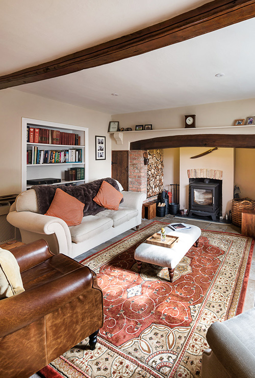 Living room inside a Grade II listed house in Dorset, a restoration project by INKSPACE Architects and Interior Designers in Dorset, Cornwall and Devon