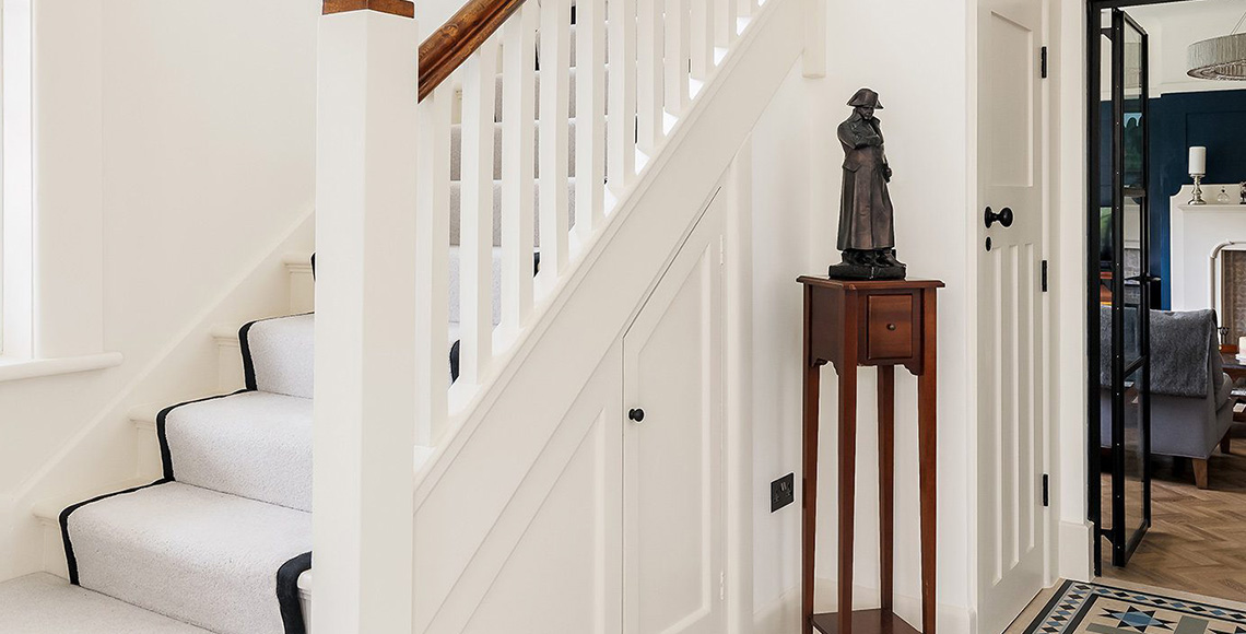 Staircase and hallway in Branksome Park, designed by INKSPACE Architects and Interior Designers in Dorset, Cornwall and Devon
