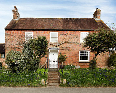 Exterior view of grade 2 listed home Tarrant House (renovation by Inkspace)